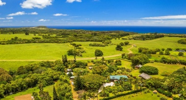 This Kauai Northshore location is more convenient than most. Off a quiet country road, you drive down a private lane to your secluded gated compound that backs up to 962 acres of pasture.