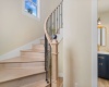 Custom Circular Staircase with Wrought Iron Decorative Railing
