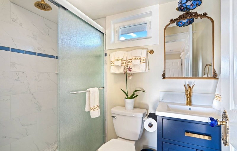 Guest ensuite - 2nd bedroom bath with walk in shower.