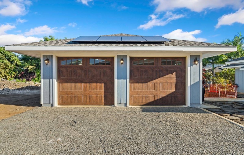 Overhead (metal) Garage Doors painted Wood Grain for durability.