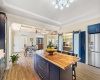 High Coffered Ceiling above Kitchen adds to the overall Ambiance