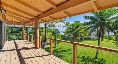 Steps away from a pristine beach that can be accessed with your own deeded path.